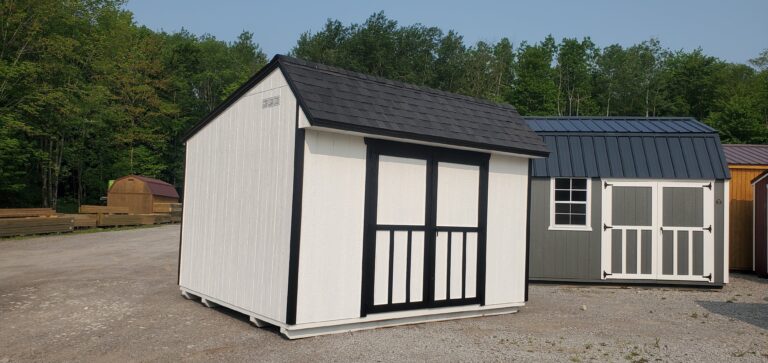 White shed black trim.