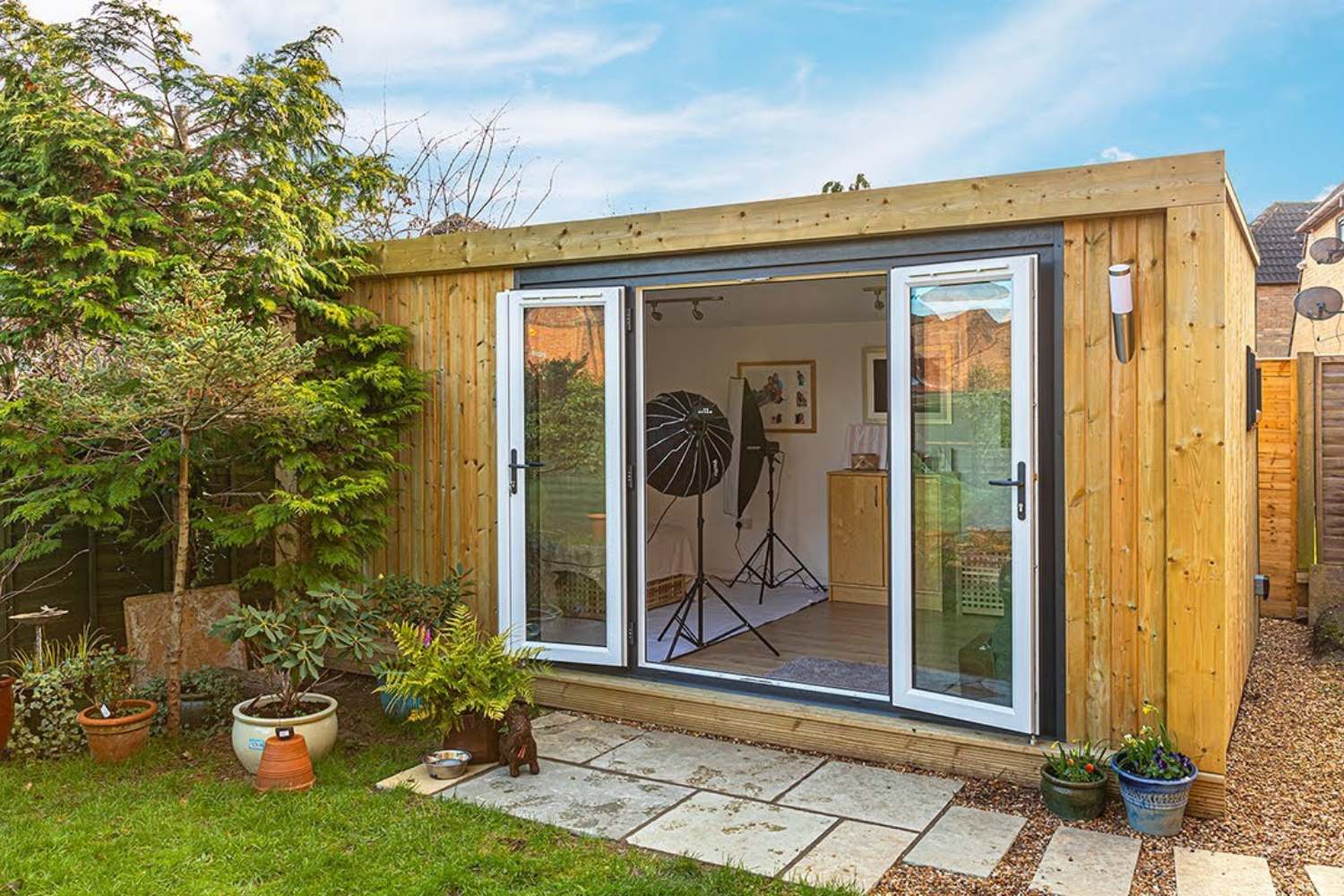 Photography studio shed with lights in view of open double doors